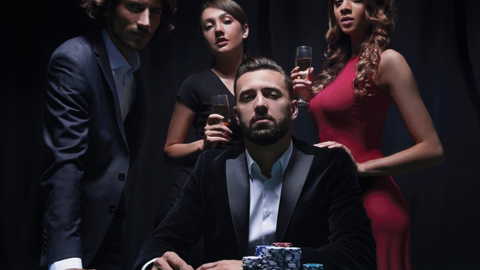 Poker player on black background